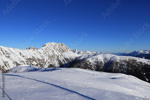 Magnificent views of the Tyrolean Alps in western Austria especially the rocky mountain Eggenkofel from the Obertilliach ski resort in the Lesachtal Valley. The slope is ideal for beginners
