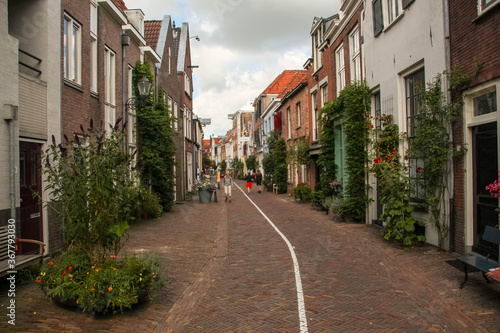 Deventer, Netherlands - July 11 2020: Famous Walstraat in the Dutch historic city center of Deventer © Pim