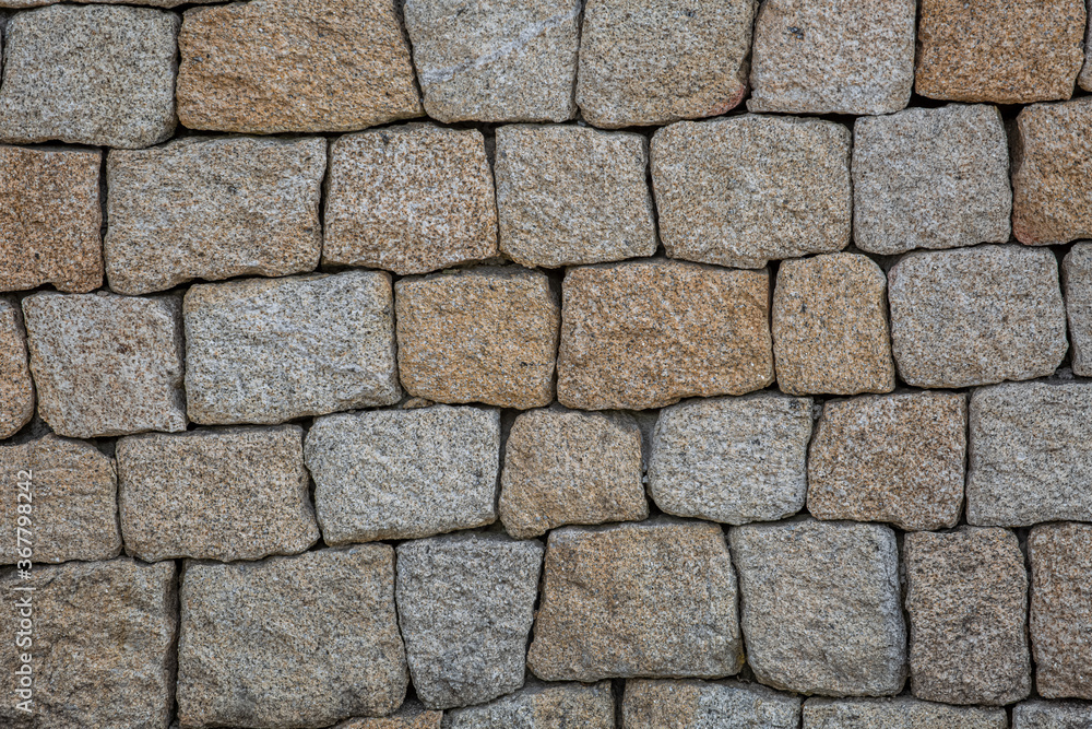 View texture in detail of paired granite wall View texture in detail of paired granite wall