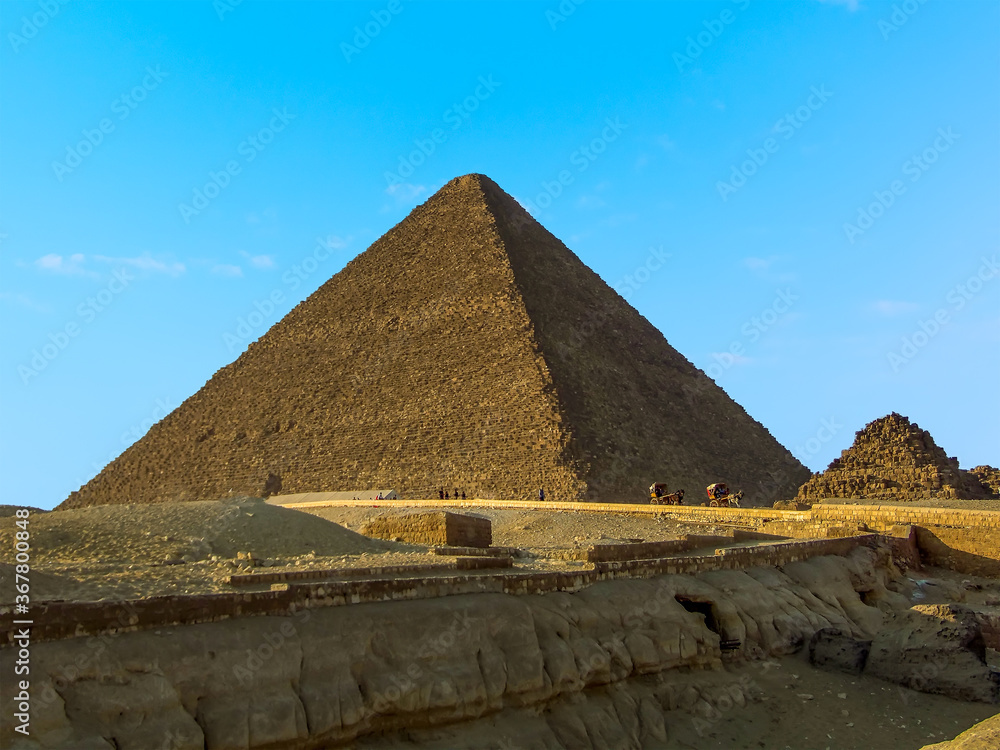 The view across the plateau at Giza, Egypt towards the Great Pyramid in summer