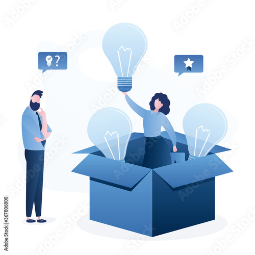 Happy woman in an opened cardboard box. Businessman thinks,  brainstorming. Successful businesswoman holds idea lightbulb.