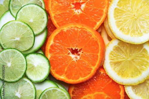 Group of shape  slices fruits background lime, orange and lemon freshness fruit and different color on frame