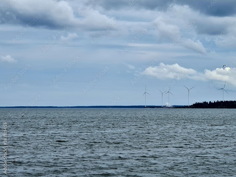 Fototapeta premium windmills at the coast