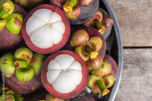 Photos Fresh ripe mangosteen fruits, Queen of fruit in Thailand