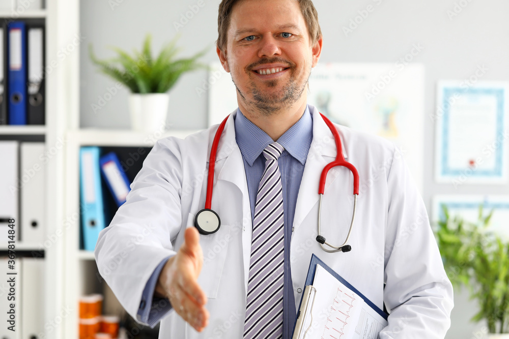 Physician ready to examine patient