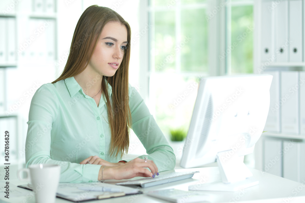 Portrait of a businesswoman working in office Portrait of a businesswoman working in office