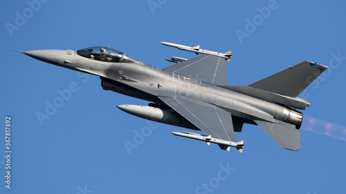 Military Air Force fighter jet aircraft on flight photo