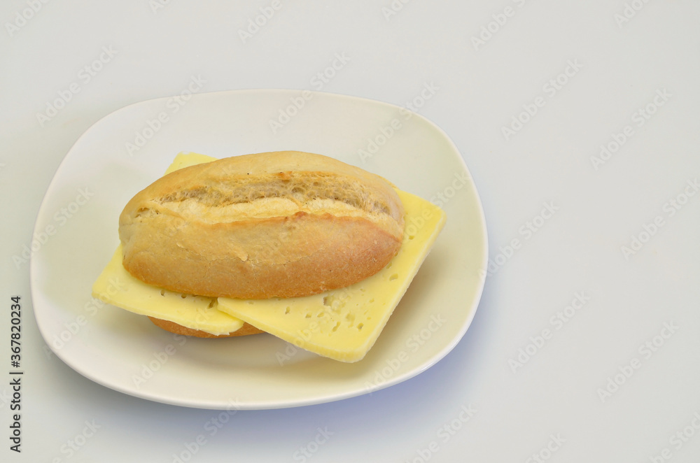Cheese sandwich on white Plate, closeup, isolated on white Background Cheese sandwich on white Plate, closeup, isolated on white Background