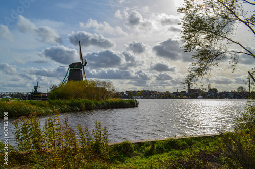 Windmills around Zaanse Schans village at north of Netherlands.