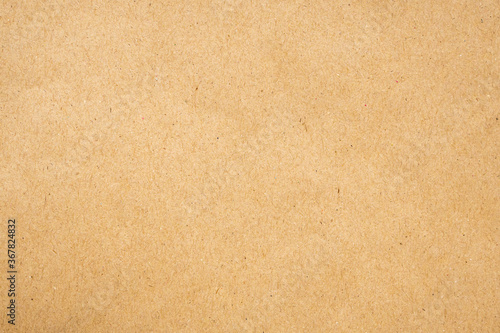 Brown eco recycled kraft paper sheet texture cardboard background