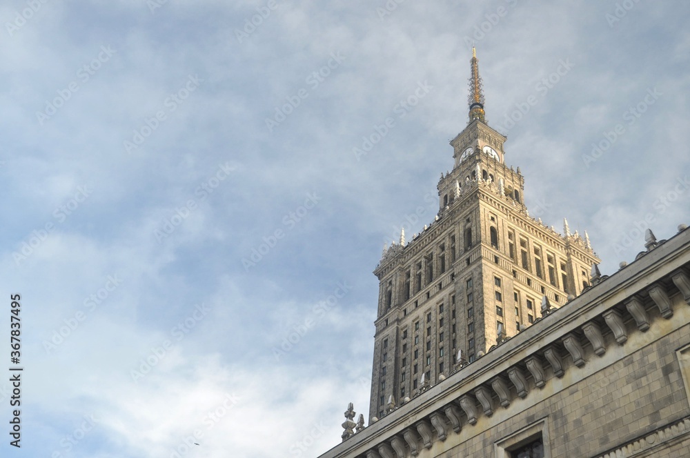 Palace of Culture and Science in Warsaw, Poland with a sky in a background.