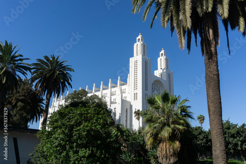 The outside of casablanca cathedral with tree in Casablanca, Morocco