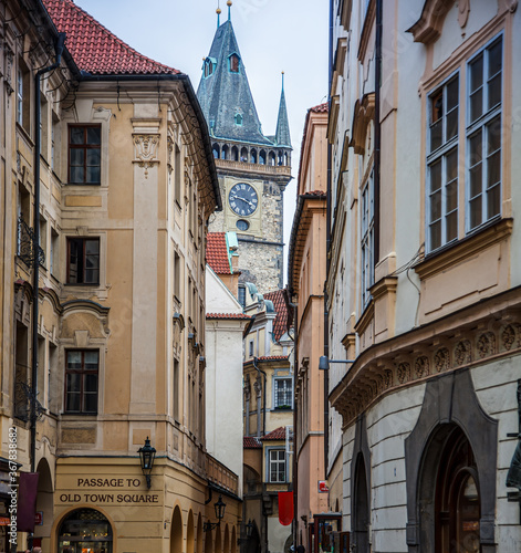 Narrow passageway in central Prague with view of Bell Tower 