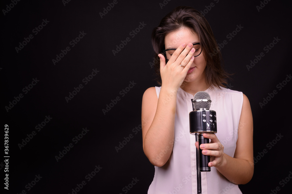 Portrait of young beautiful businesswoman with short hair