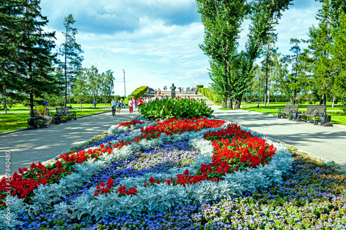 Public park decorated with colorful flowerbeds in the Eastern Siberian city of Irkutsk, Russia photo