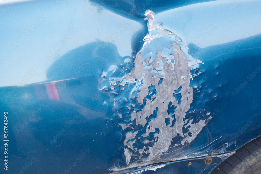 damage to the car body resulting from vandalism damage to the car body resulting from vandalism