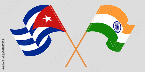 Crossed and waving flags of Cuba and India