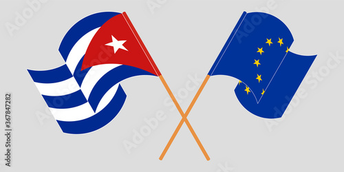 Crossed and waving flags of Cuba and the EU