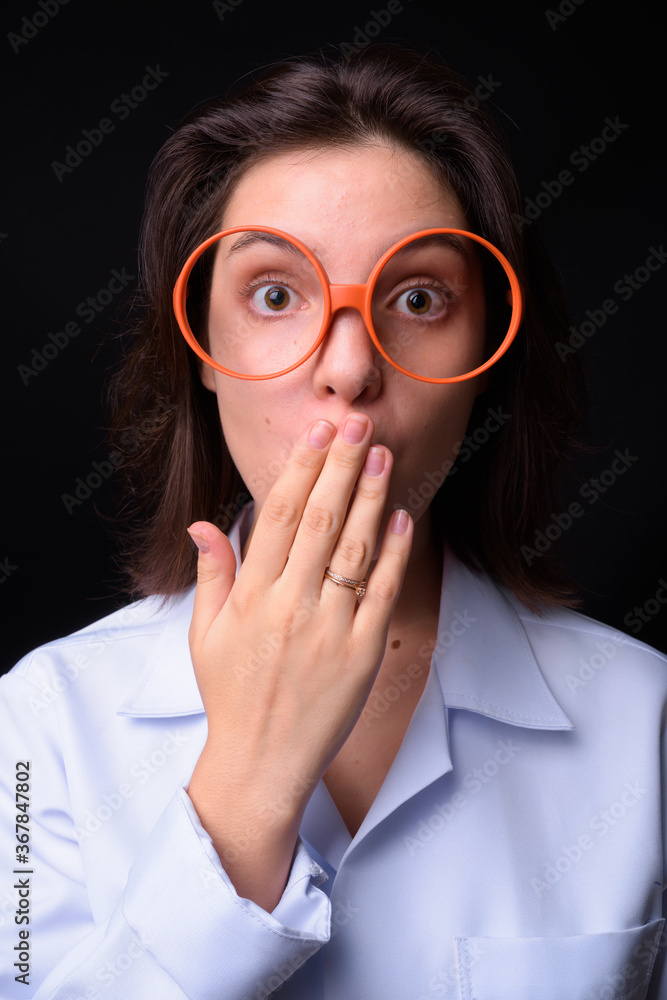 Portrait of young beautiful woman doctor with short hair Portrait of young beautiful woman doctor with short hair
