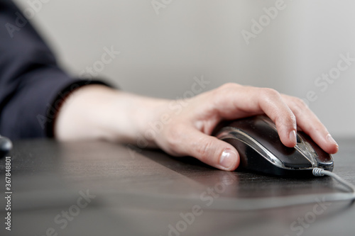 close up of businesswoman using computer mouse © fox17