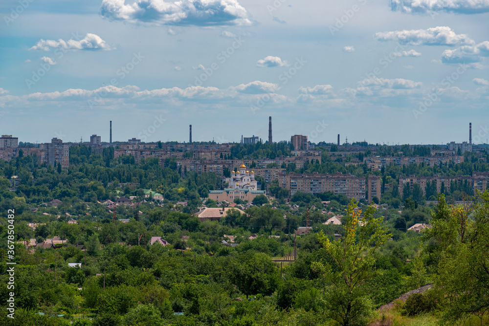 Fototapeta premium Scenic city view from the hill.