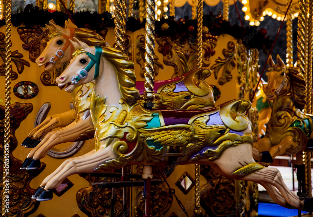 Colourful Fairground Carousel Horses Close Up View