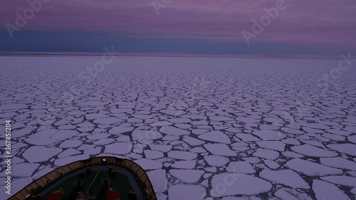 Travel on the icebreaker in the ice, Antarctica photo