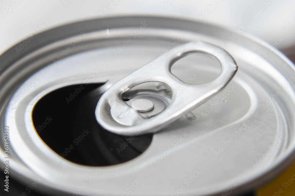 close-up of an open aluminum soda can close-up of an open aluminum soda can