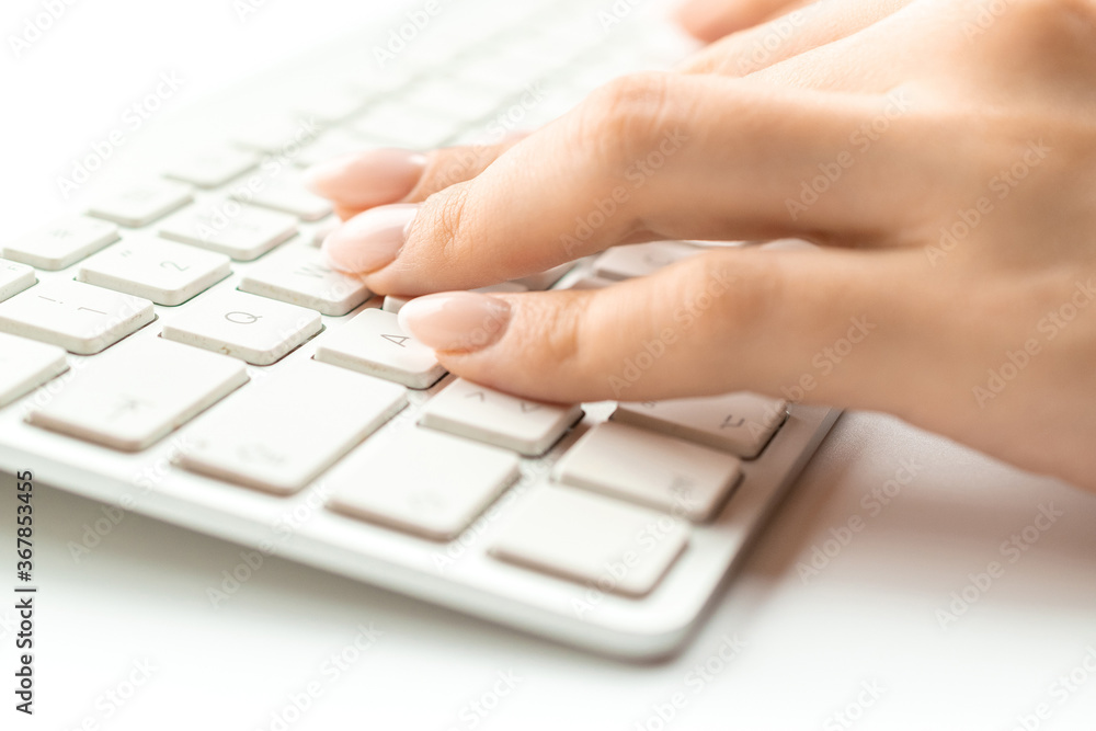 Keyboard typing. Hand typing on desktop office computer keyboard. Woman using laptop. Female online work female. Online shopping, payment using concept Keyboard typing. Hand typing on desktop office computer keyboard. Woman using laptop. Female online work female. Online shopping, payment using concept
