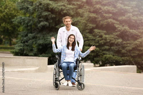 Doctor and young woman in w...