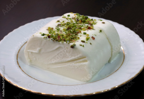 Milk ice cream. Handmade ice cream with pistachio nuts. Maras ice cream. (Maras Dondurmasi)