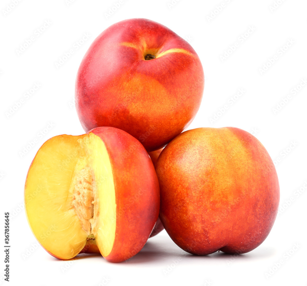 Sweet ripe nectarines on white background