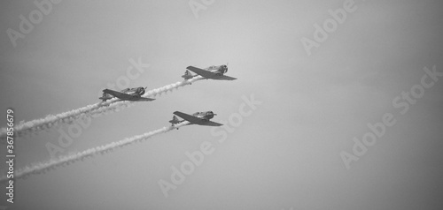 airplane acrobacy on the sky vintage planes
