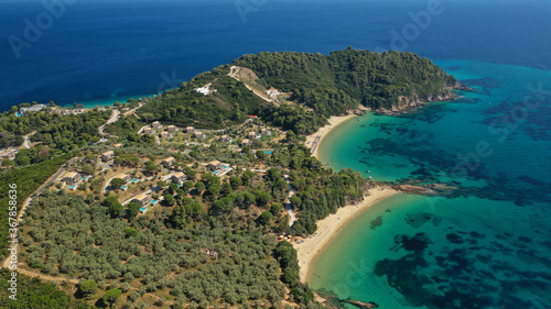Fototapeta Naklejka Na Ścianę i Meble -  Aerial drone photo of paradise beaches of Banana and small Banana covered with pine trees in beautiful island of Skiathos, Sporades, Greece