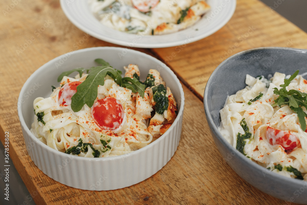 handmade fresh pasta with cheese and tomatoes handmade fresh pasta with cheese and tomatoes