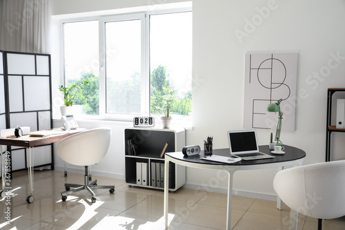 Interior of comfortable modern office © Pixel-Shot