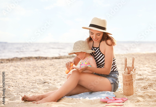 Mother and her little daugh...