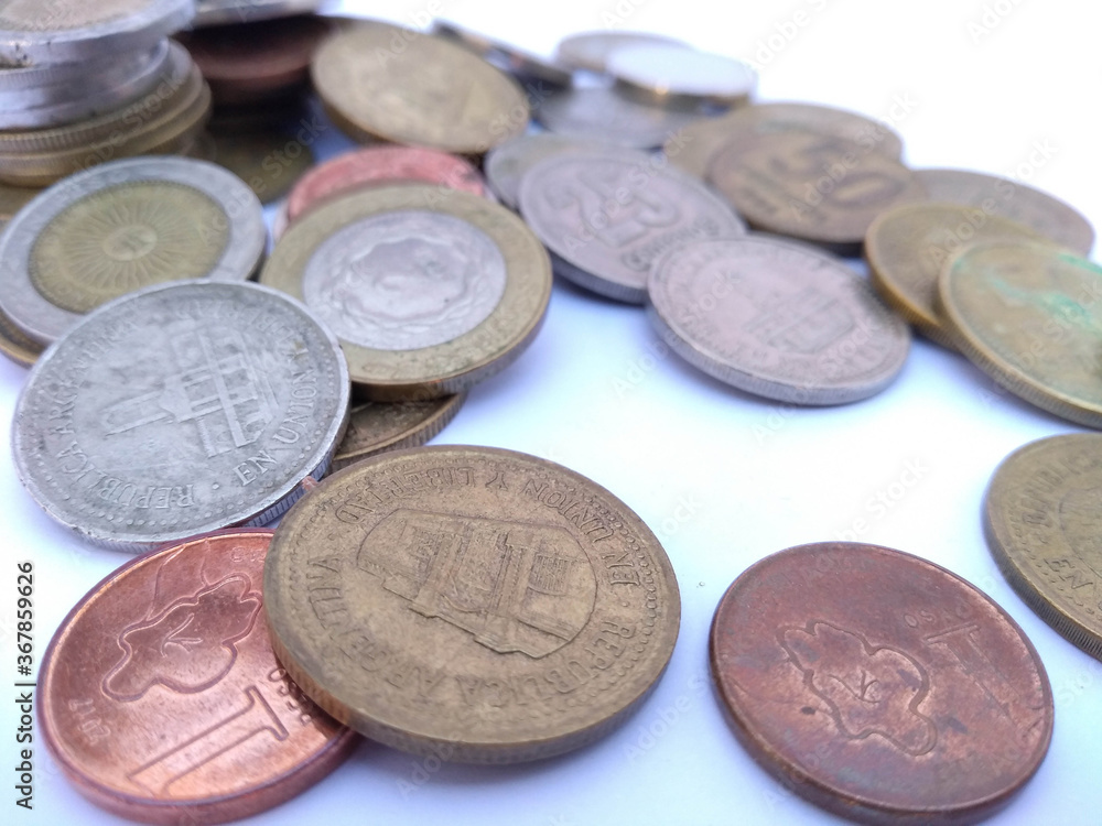 Banknotes and coins on white background Banknotes and coins on white background