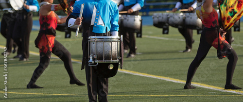 Drummers playing in a marching band