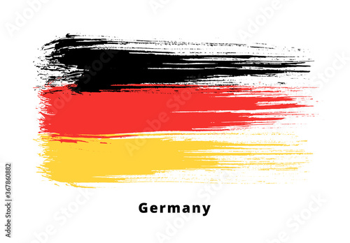 Painted grunge German flag. Brush strokes on white background. Grunge design element. Painted ink stripes