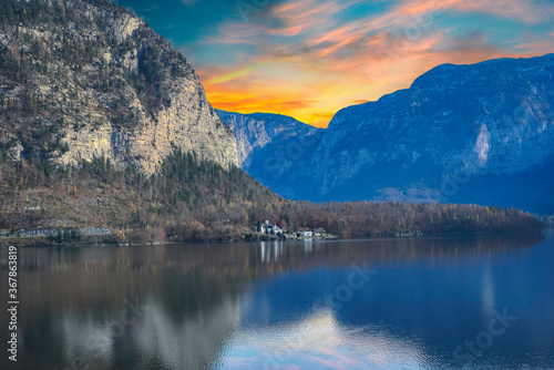 Lake hallstatt twilight with mountain and castle in Austrian Alps