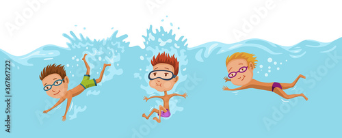 Childrens swimming in pool. Cheerful and active little boys and girls swimming in pool. Boys and girls in swimwear are swimming in a children pool. Underwater view. Sport team