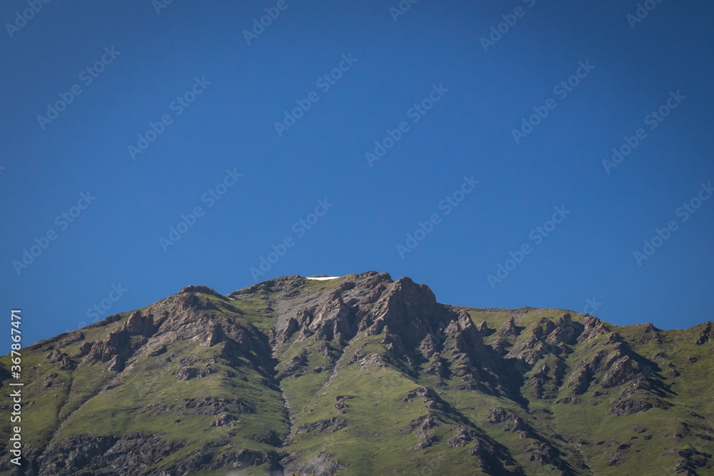 mountainous landscape of Piedmont peaks on a sunny day with clear blue skies mountainous landscape of Piedmont peaks on a sunny day with clear blue skies
