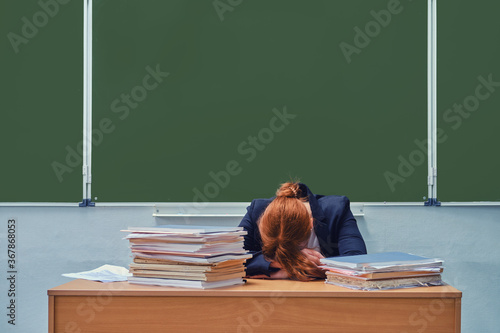 Принти на полотні Woman teacher sleeps with head resting, copy space