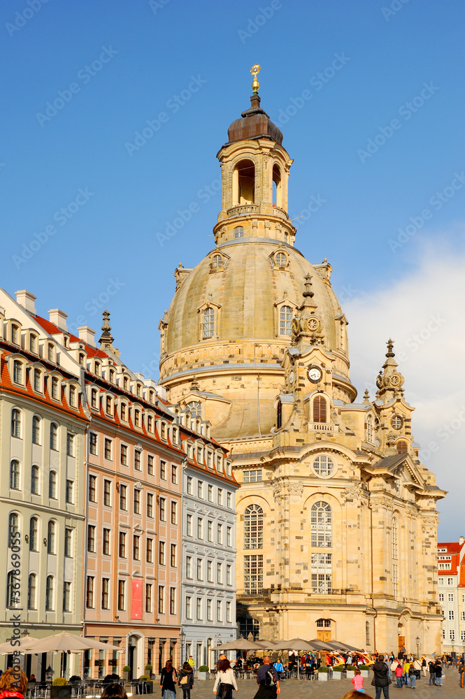 The square surrounding the Frauenkirche in Dresden, Germany on a busy day with a bustling crowd of people. 