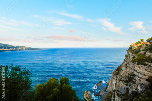 View of a villa on the cliffs overlooking the bay near Sorrento on the Amalfi coastline of Italy