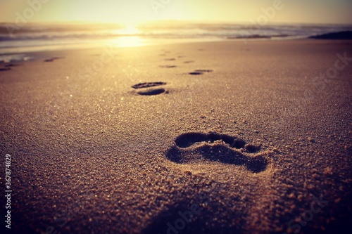 footprints at sunset
