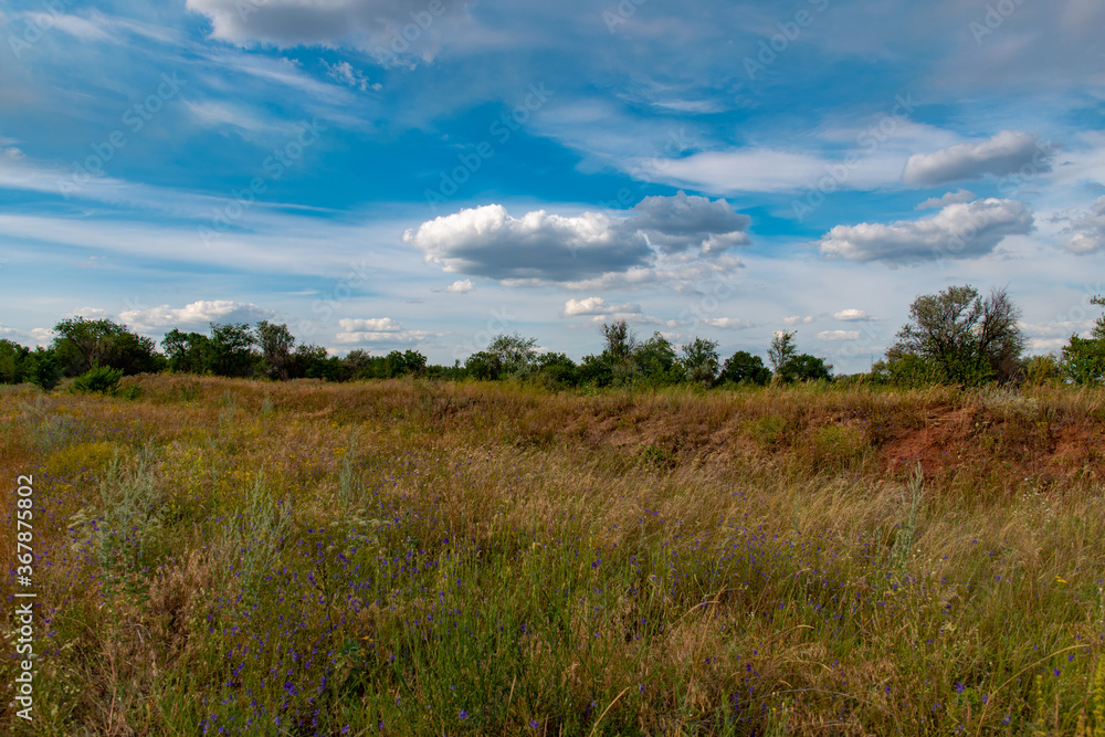 Ukraine, Krivoy Rog, the 16 of July 2020. Abandoned city park with beautiful clouds in the sky. Ukraine, Krivoy Rog, the 16 of July 2020. Abandoned city park with beautiful clouds in the sky.