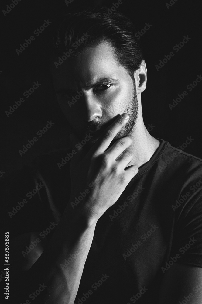 portrait of a young man in black portrait of a young man in black