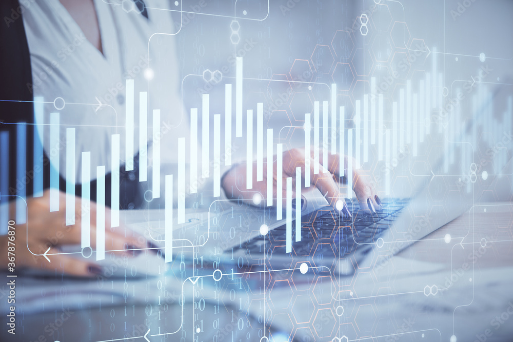 Double exposure of businesswoman hands typing on computer and forex graph hologram drawing. Financial analysis concept. Double exposure of businesswoman hands typing on computer and forex graph hologram drawing. Financial analysis concept.